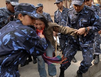 http://southasiarev.files.wordpress.com/2010/01/nepal-police-subdue-protester-e1264386553321.jpg?w=350&h=268